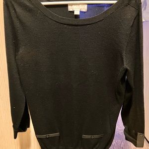 Carolyn Taylor’s black sweater
